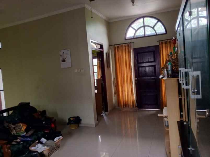 dijual rumah cluster taman tjikini