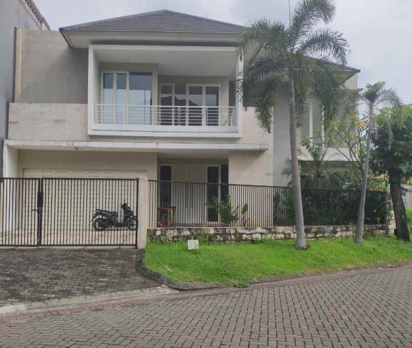 dijual rumah graha family babatan kec