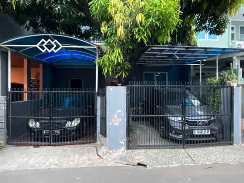 dijual rumah taman modern