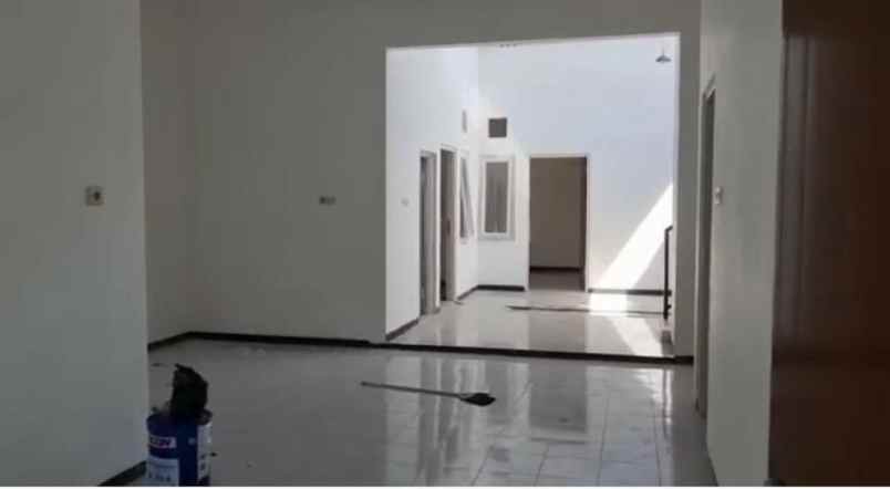 dijual rumah taman wiguna selatan