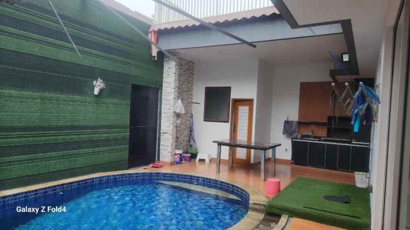 disewakan rumah cluster palm spring jgc