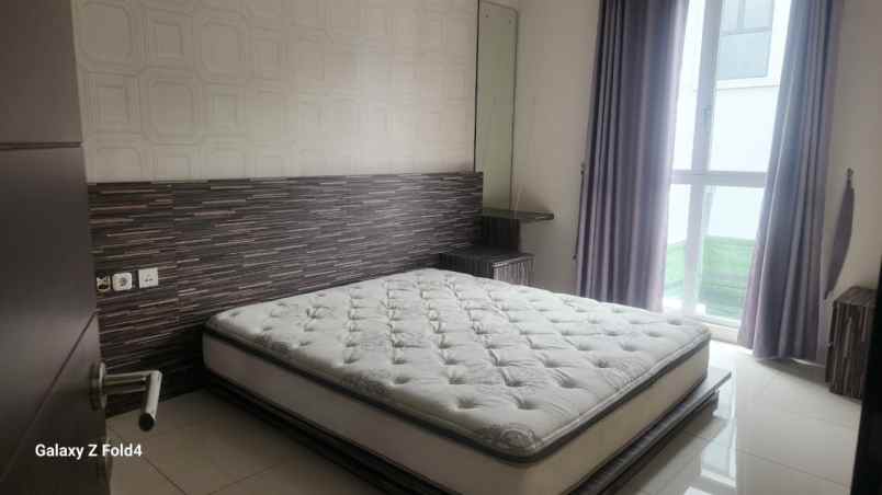 disewakan rumah cluster palm spring jgc