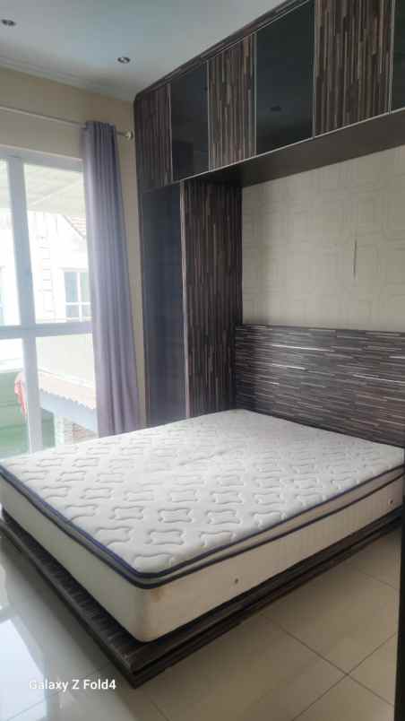 disewakan rumah cluster palm spring jgc