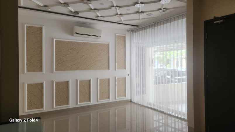 disewakan rumah cluster palm spring jgc