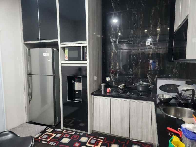 disewakan rumah cluster palm spring jgc