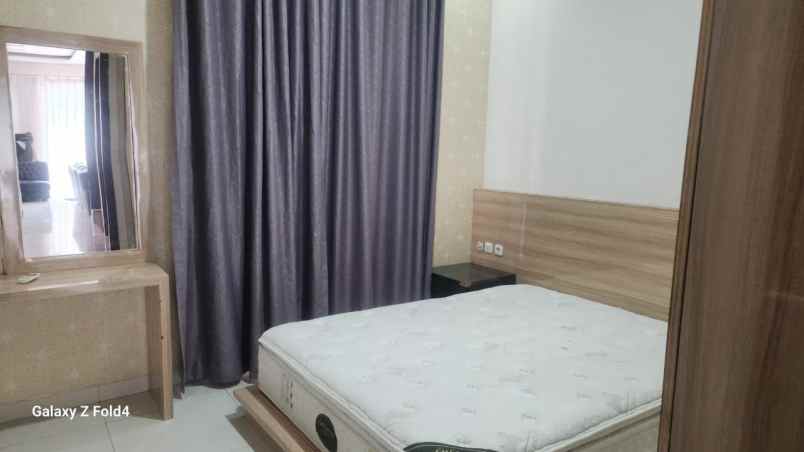 disewakan rumah cluster palm spring jgc