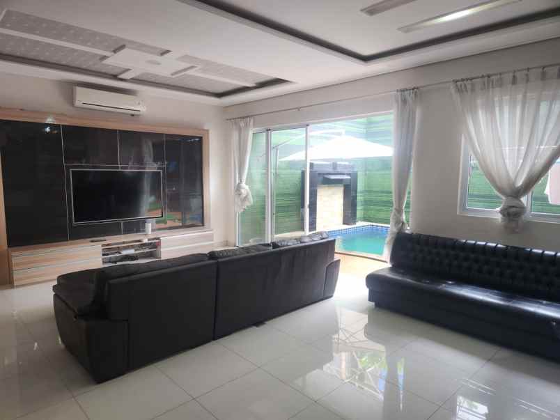 disewakan rumah cluster palm spring jgc