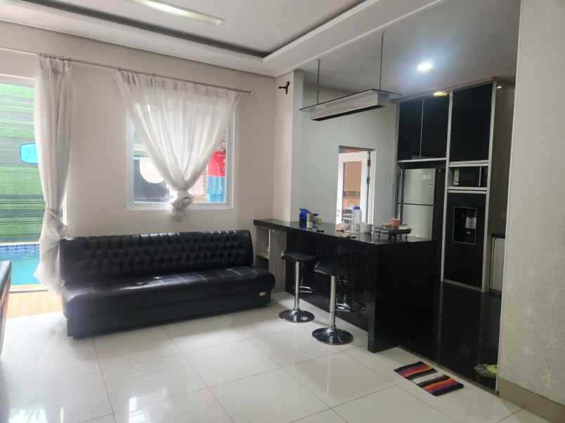 disewakan rumah cluster palm spring jgc