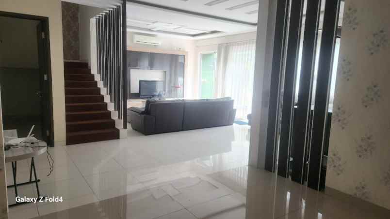 disewakan rumah cluster palm spring jgc