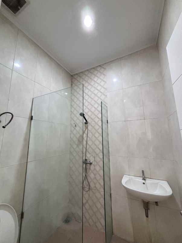 one gate cluster rumah tki 5