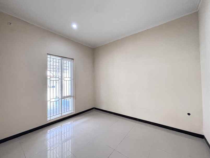 one gate cluster rumah tki 5