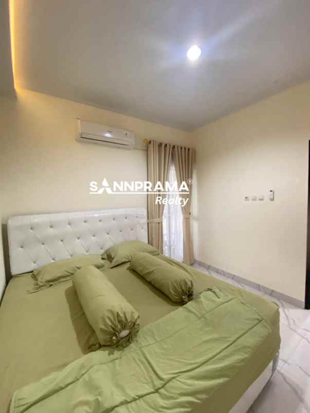 rumah apik siap huni dalam cluster di bedahan sawangan