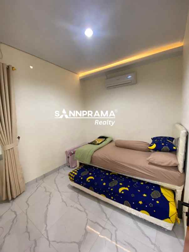 rumah apik siap huni dalam cluster di bedahan sawangan
