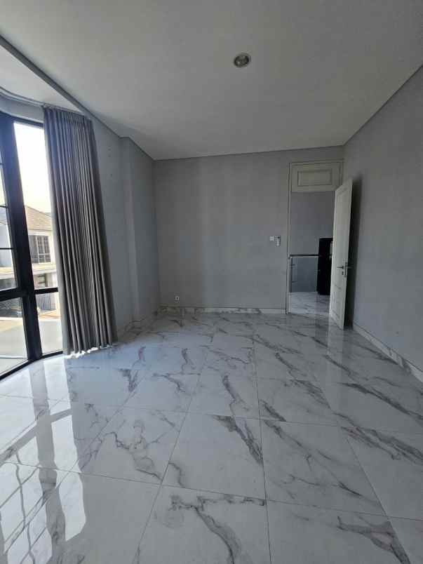rumah aruba villa pakuwon city minimalis siap huni