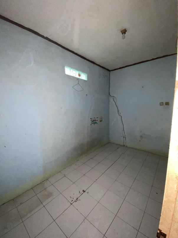 rumah jl cemara ii no 99 rt 003