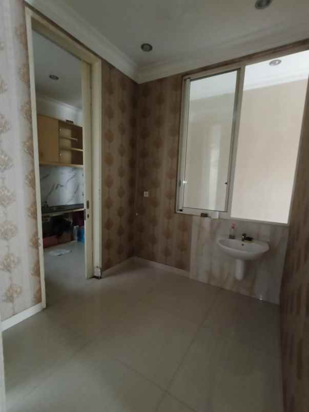 rumah pakuwon indah cluster la riz wood
