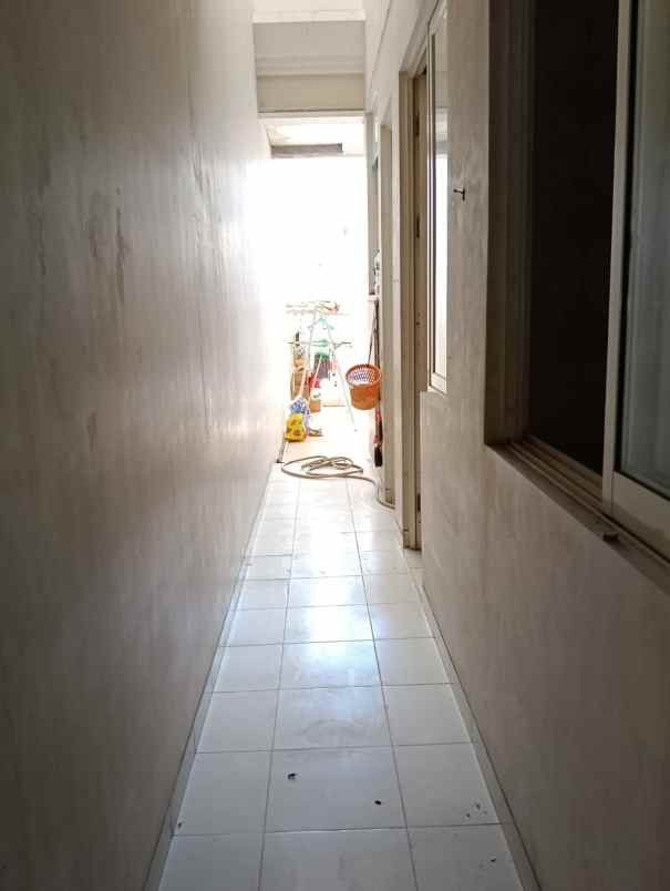 rumah pakuwon indah cluster la riz wood