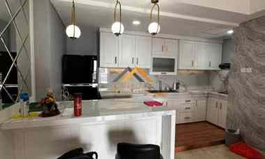dijual apartemen podomoro city deli tower