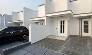 dijual rumah jalan raya benda baru