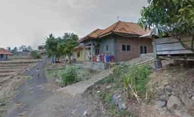 dijual rumah kampung pinggir jalan desa