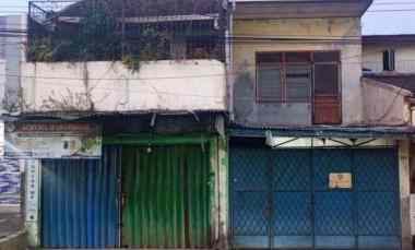 dijual rumah pinggir jalan raya