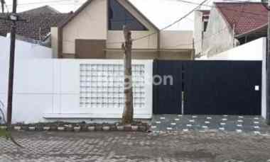dijual rumah raya wiguna selatan