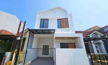 dijual rumah taman harapan baru