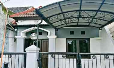 dijual rumah wiguna