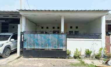 over kredit rumah taman mutiara indah 2