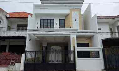 rumah babatan pantai new gress row 3 mobil