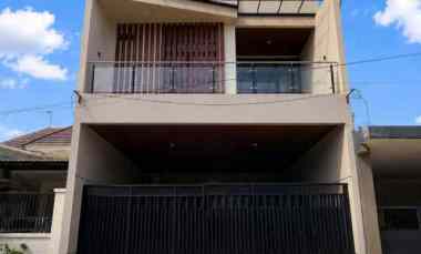rumah babatan pantai new minimalis carport 2