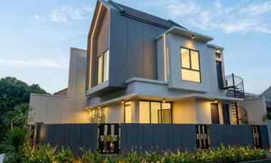 rumah babatan pantai strategis row 3 mobil carport 2