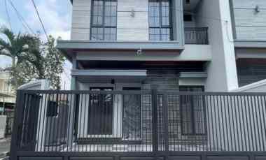 rumah manyar jaya surabaya minimalis row jalan 4 mobil
