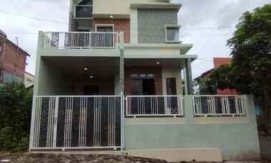 rumah modern 2 lantai kawasan nyaman jalan lebar