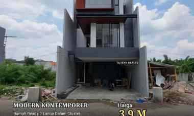rumah modern kontemporer dalam cluster