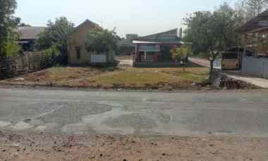 tanah rata dan padat strategis pinggir jln raya